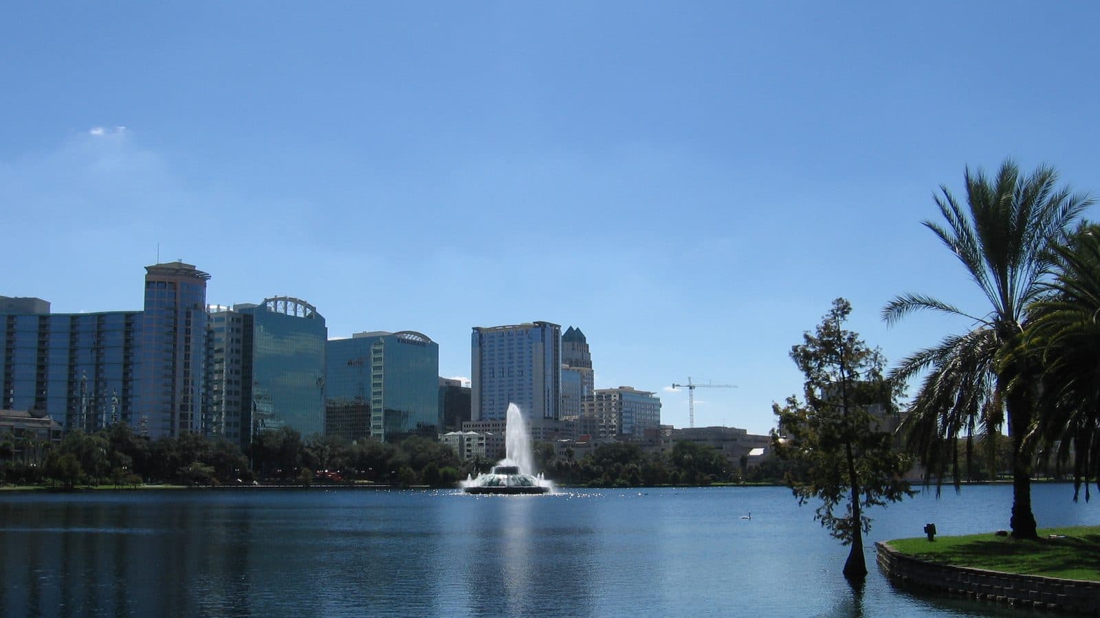 The fountain at Lake Eola Park with downtown Orlando behind it
